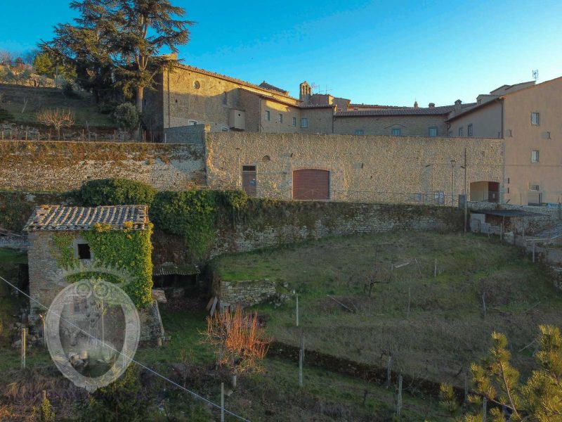 Ancient Stone Villa with Olive Groves & Vineyard Inside Cortona’s Walls