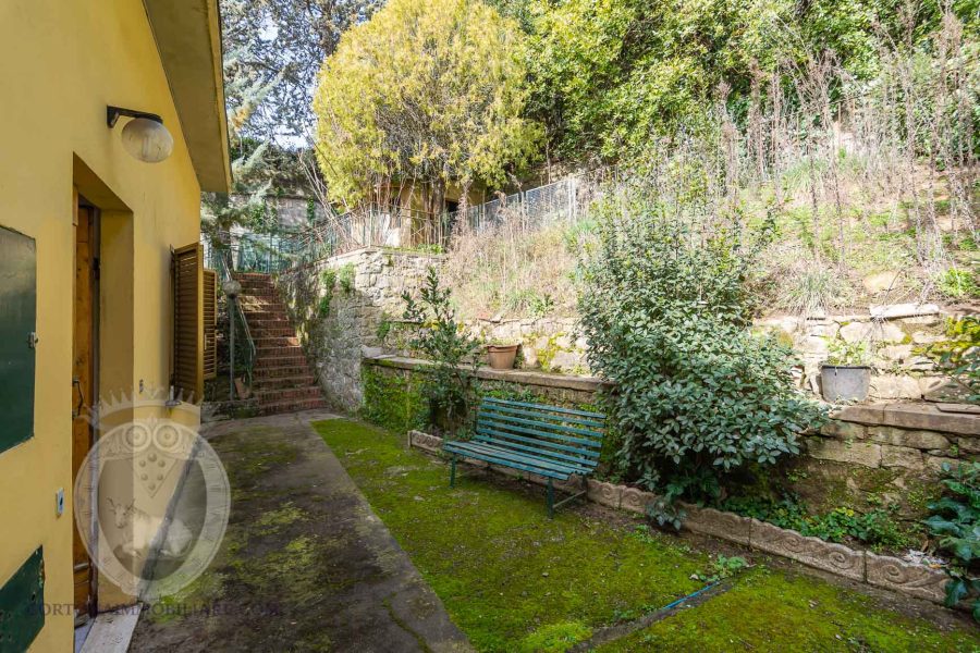 Casa con giardino privato