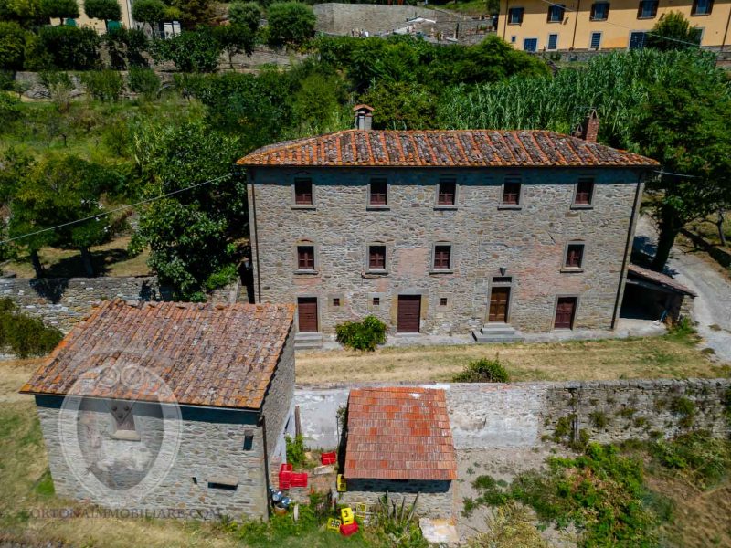 Farmhouse with garden and outbuilding