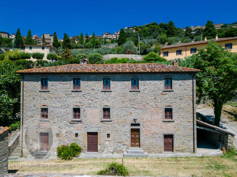 Farmhouse with garden and outbuilding