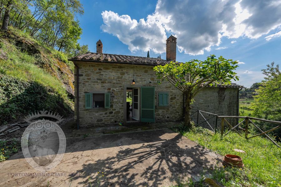 Stone farmhouse with land
