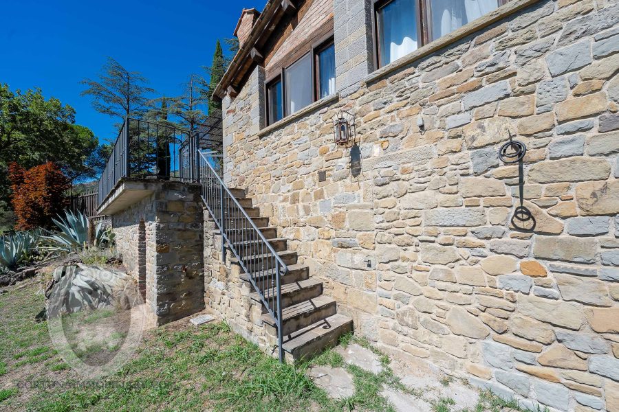 Farmhouse with view, land and outbuildings