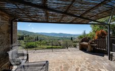Farmhouse with view, land and outbuildings