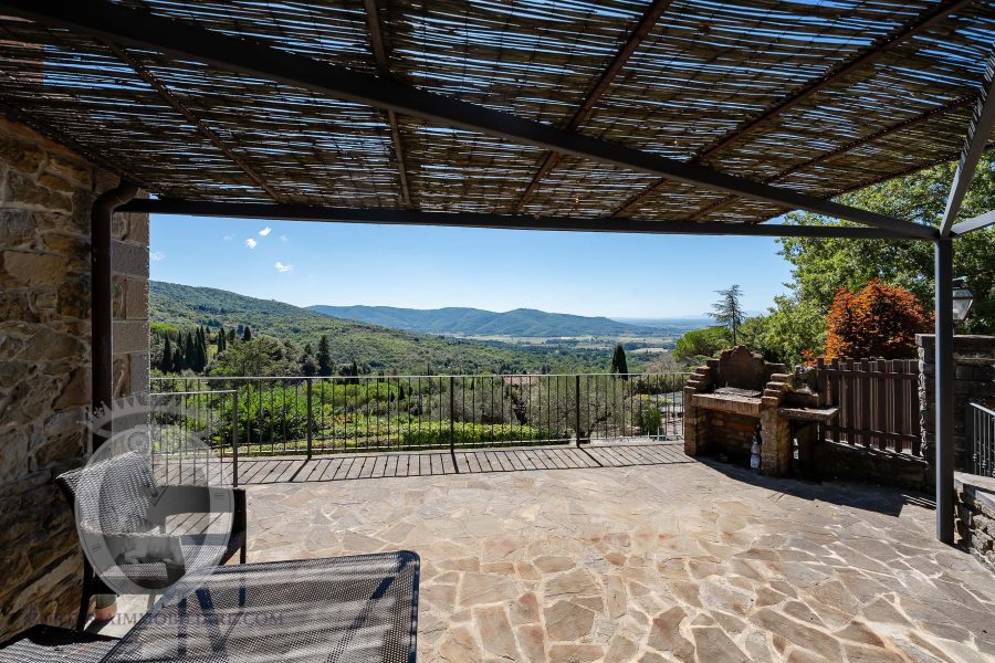 Farmhouse with view, land and outbuildings