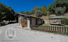 Farmhouse with view, land and outbuildings