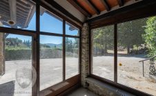 Farmhouse with view, land and outbuildings