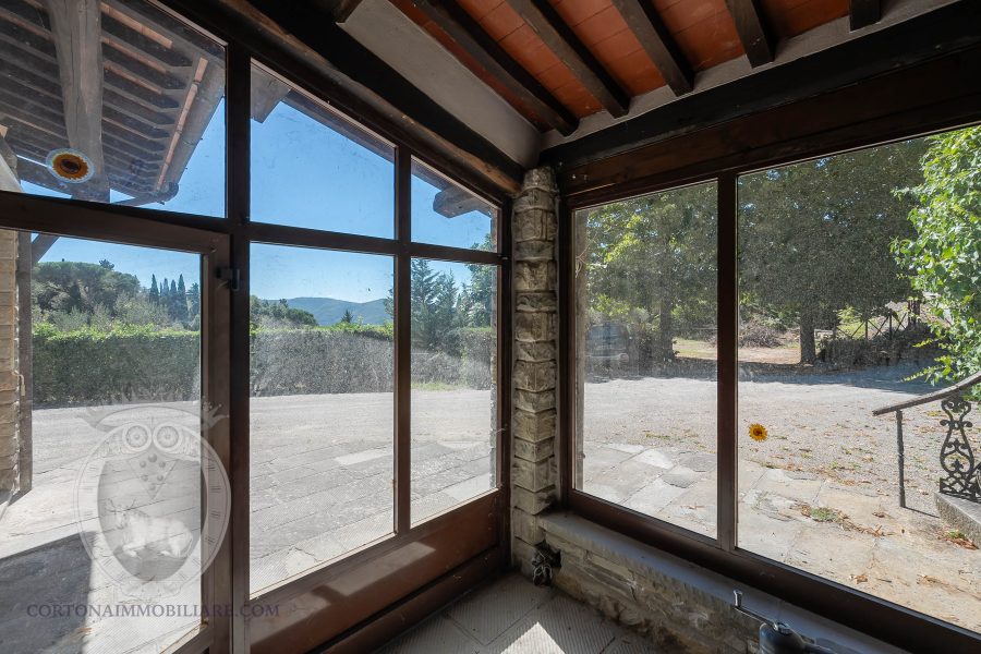 Farmhouse with view, land and outbuildings