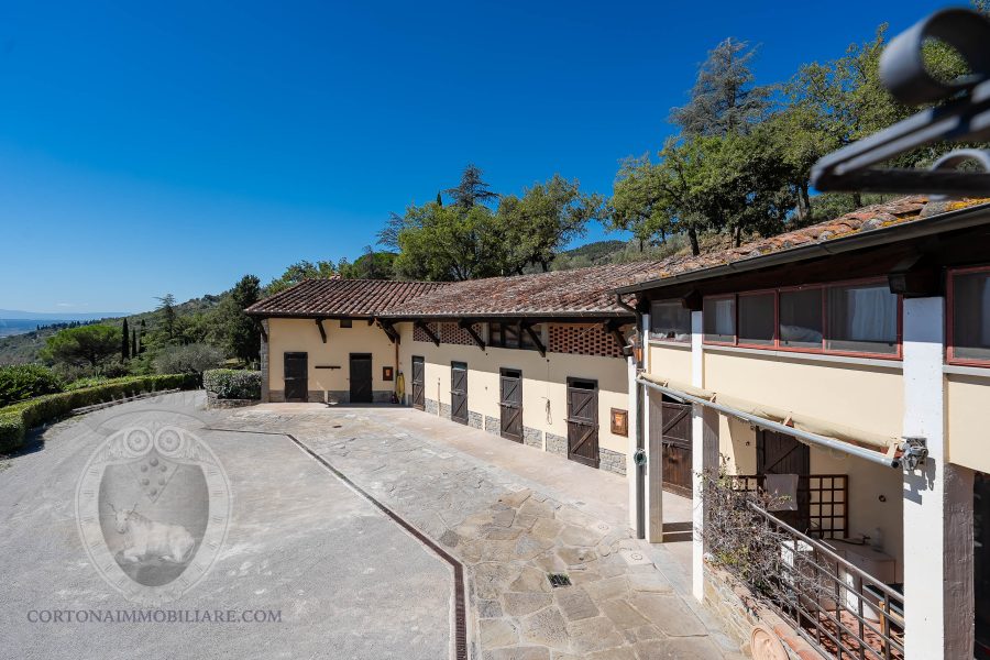 Farmhouse with view, land and outbuildings