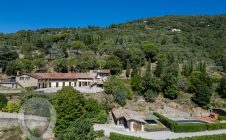 Farmhouse with view, land and outbuildings