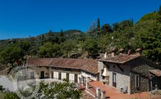 Farmhouse with view, land and outbuildings