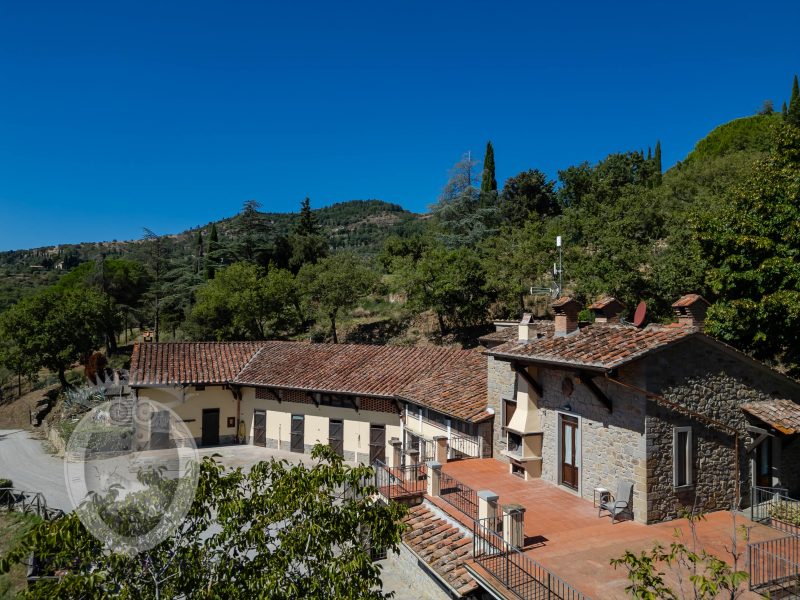 Farmhouse with view, land and outbuildings