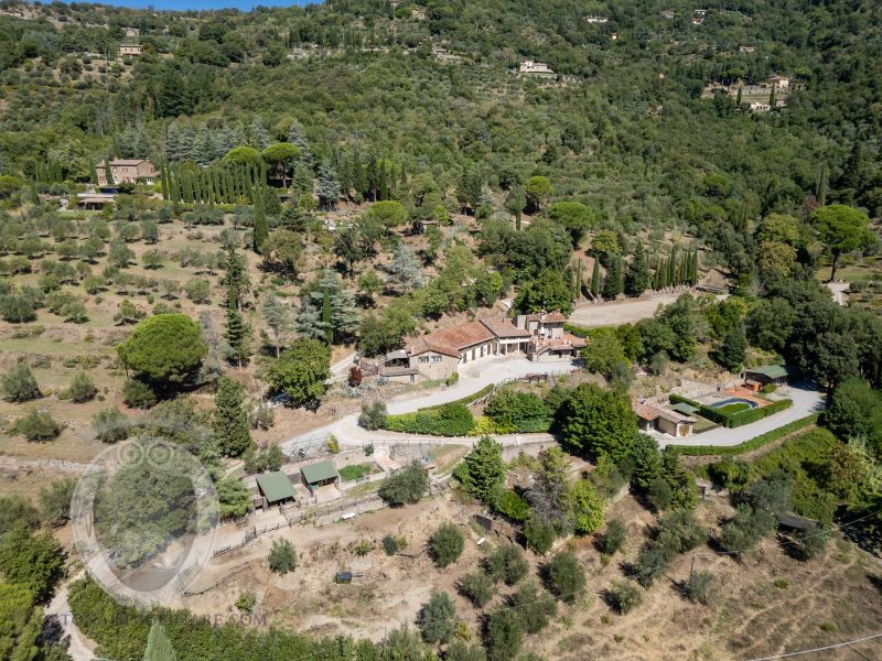 Farmhouse with view, land and outbuildings