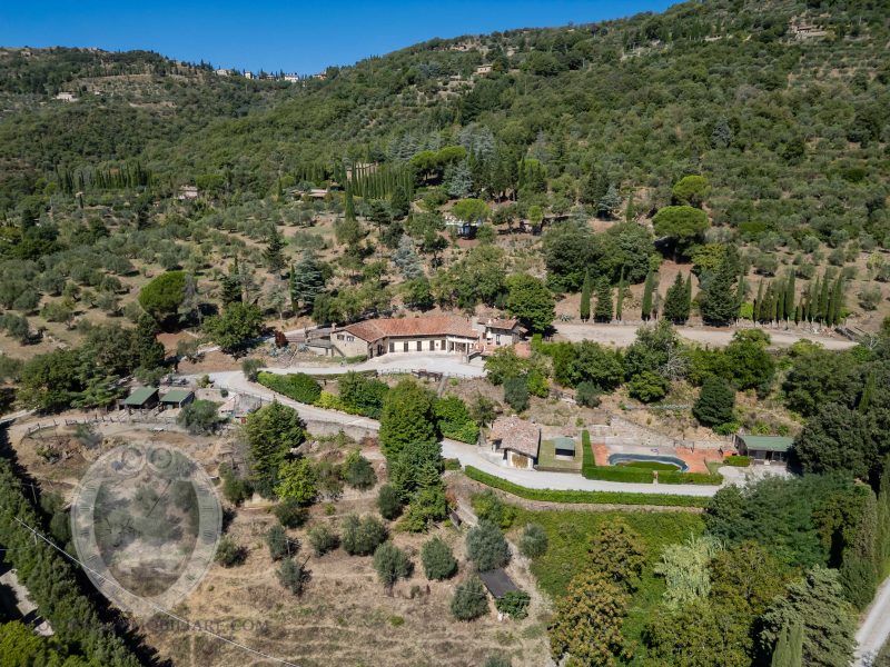 Farmhouse with view, land and outbuildings