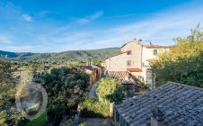 Detached terraced house with garden