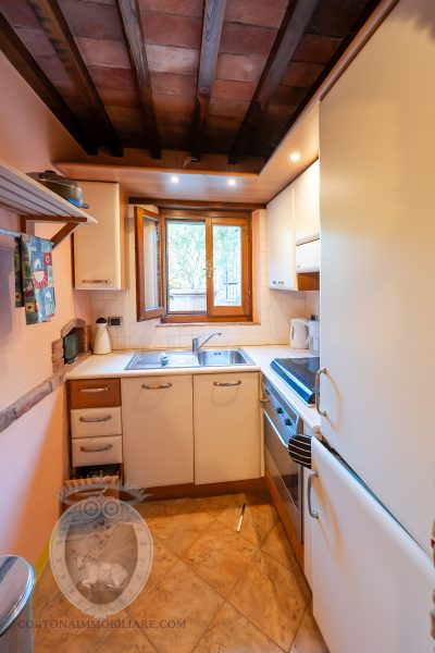 Detached terraced house with garden