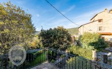 Detached terraced house with garden